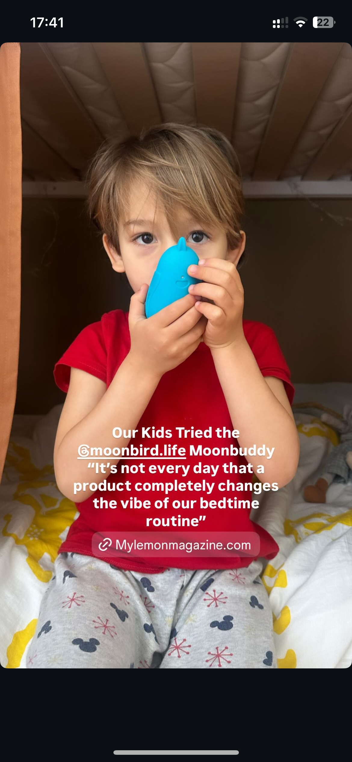 Child holding moonbuddy for stress relief