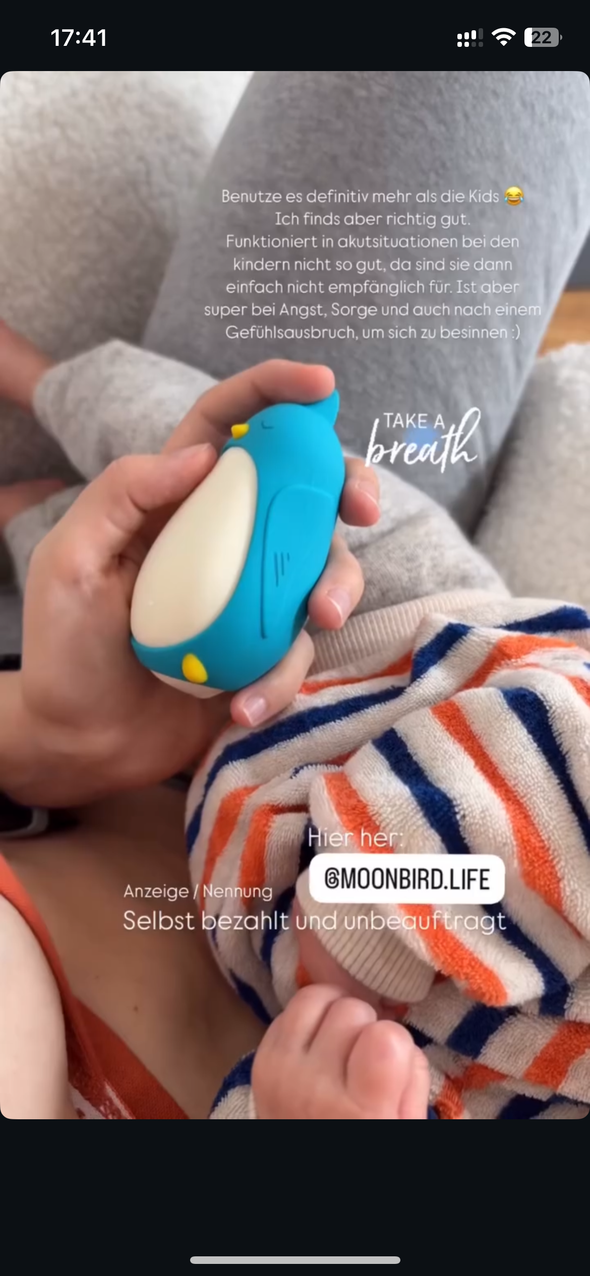 Child with moonbuddy breathing device for calm